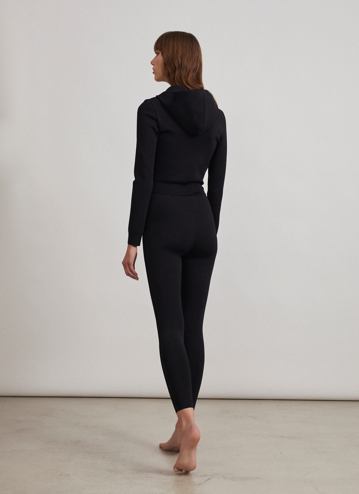 Technical knit zipped jacket
 ALAÏA BLACK TECHNICAL KNIT ZIPPED JACKET